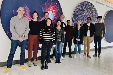 A group of scholars in the Koch Institute Public Galleries